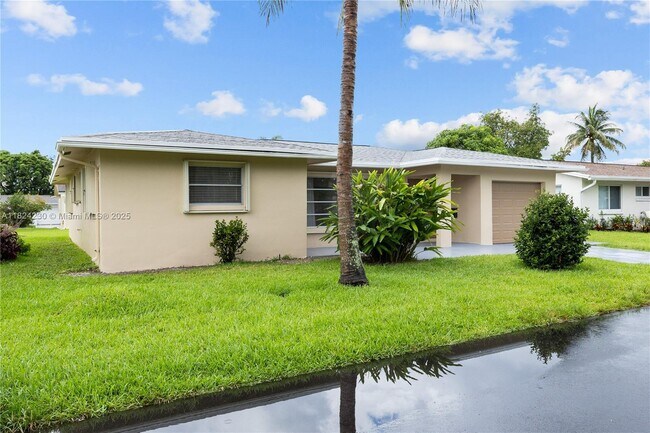 Building Photo - 7312 NW 58th Ct
