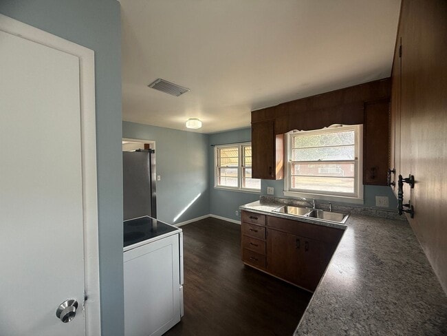 Building Photo - Two bedrooms, one and half bathroom, pet friendly, home, with a one car, detached garage!