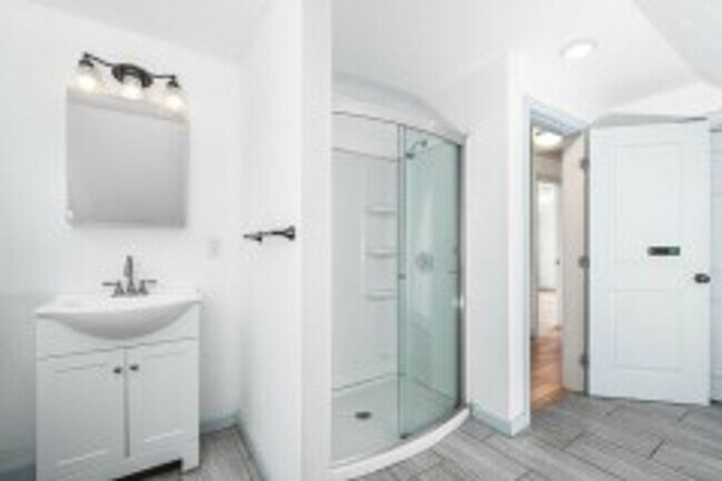 Building Photo - Renovated 4BR with In-Unit Laundry Near Moody Street