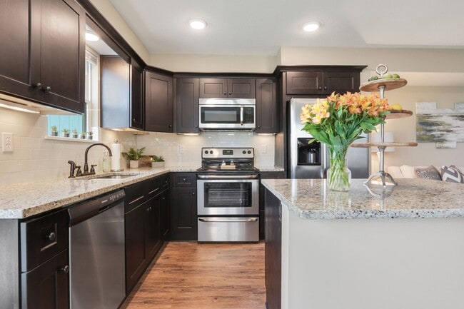 Building Photo - Serrano Townhomes: Where Comfort Meets Con...