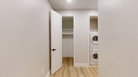 This sleek 630-square-foot apartment at 95 Wall Street offers a perfect blend of style and functionality in the heart of Manhattan. The open-concept design maximizes space, seamlessly integrating the living room and kitchen. Floor-to-ceiling windows flood the space with natural light and provide breathtaking views of the surrounding cityscape.

The kitchen boasts modern wood cabinetry, stainless steel appliances, and a gas range, making it ideal for both everyday cooking and entertaining. The living area features light wood flooring that extends throughout the apartment, creating a sense of continuity and spaciousness.

The generously sized 160-square-foot bedroom offers ample space for rest and relaxation. Built-in closets provide essential storage solutions. The bathroom is elegantly appointed with a contemporary vanity, large mirror, and a combination tub and shower.

Throughout the apartment, recessed lighting and clean lines contribute to the overall modern aesthetic. The unit is equipped with a wall-mounted heating and cooling system for year-round comfort. This thoughtfully designed space offers an ideal urban retreat in one of New York City's most coveted neighborhoods.