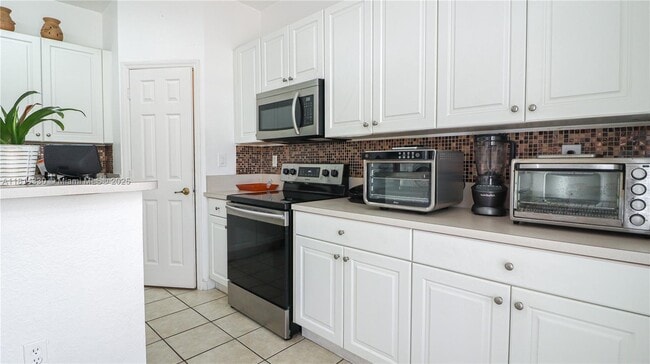 Building Photo - 5662 NW 112th Ct