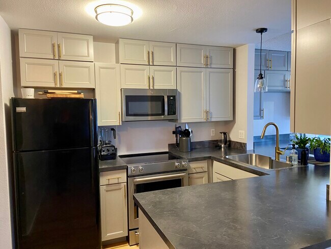 Foto del edificio - 3041 E 42nd Ave