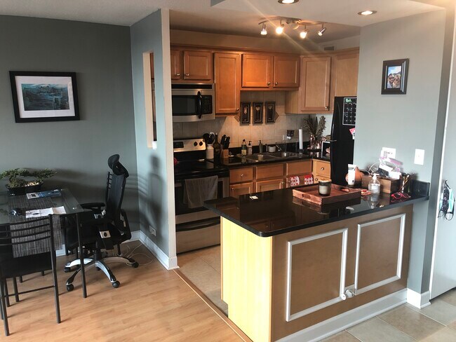 Kitchen + Dining Room - 2728 N Hampden Ct