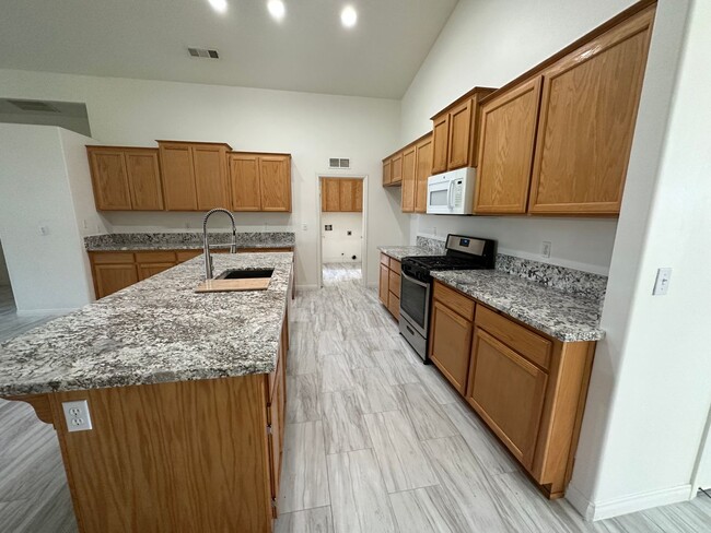 Building Photo - Spacious 4-Bedroom Gem with Modern Upgrade...