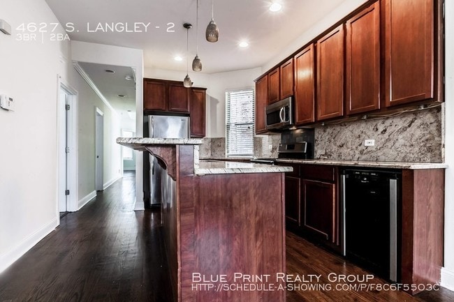 Building Photo - 4627 S Langley Ave
