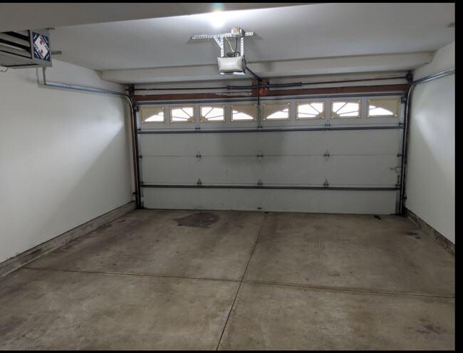 Heated Attached Garage View from Door - 1487 Stonefield Dr