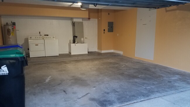 Two car garage. With washing machine and dryer. - 7438 Victoria Cir