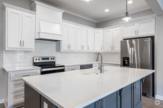 3BR, 3.5BA - 2,795SF - Kitchen - Swallowtail Flats Apartments
