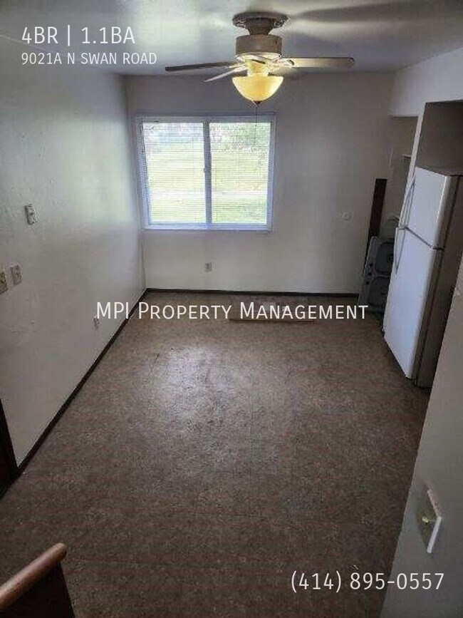 Building Photo - 9021 N Swan Rd