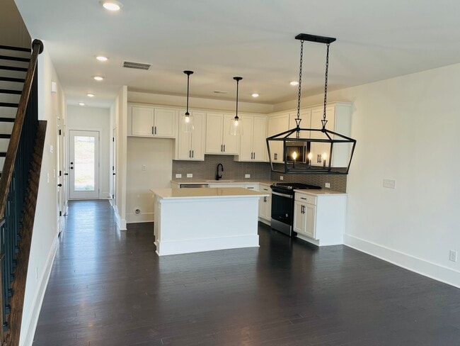 Building Photo - BRAND NEW Townhome located across from Wes...