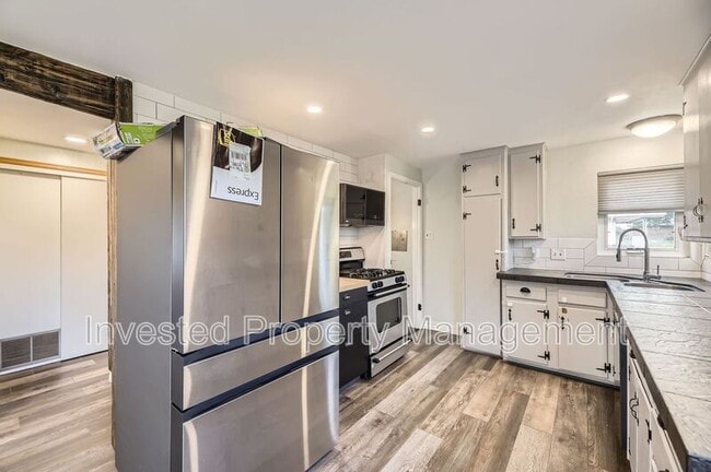 Building Photo - 8411 W 64th Pl