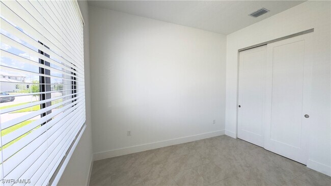 Building Photo - 5097 Penella Ave