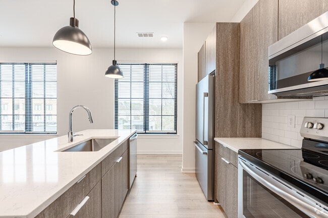 2BR, 2.5BA - 1,044SF - Kitchen - The Mill District