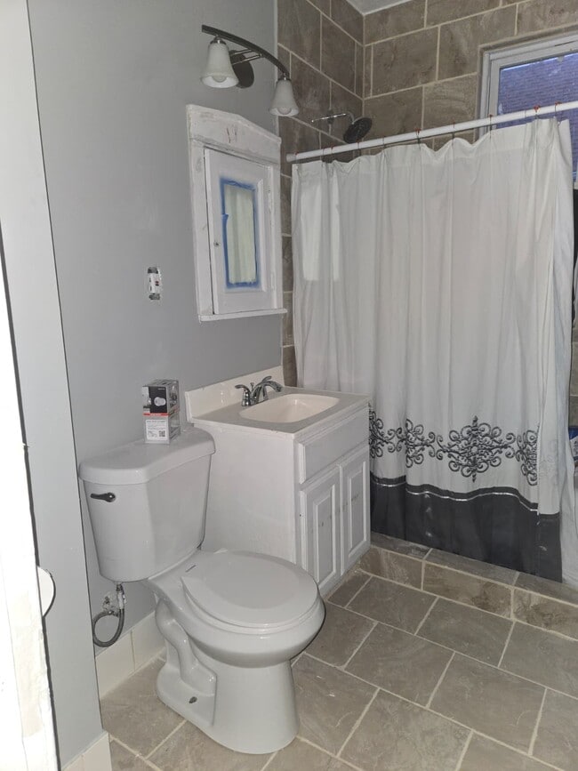 Building Photo - 8445 S Marquette Ave