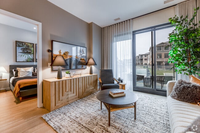 2BR, 2BA - 785SF - Living Room - Camby