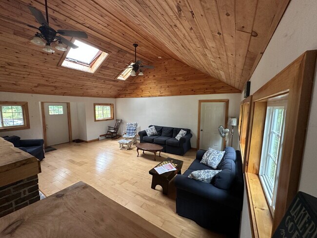 Building Photo - Charming 3BR Waterfront Retreat with Sunroom, Brick Accent & Scenic Lake Views