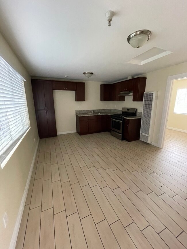 Building Photo - 3856 S Normandie Ave