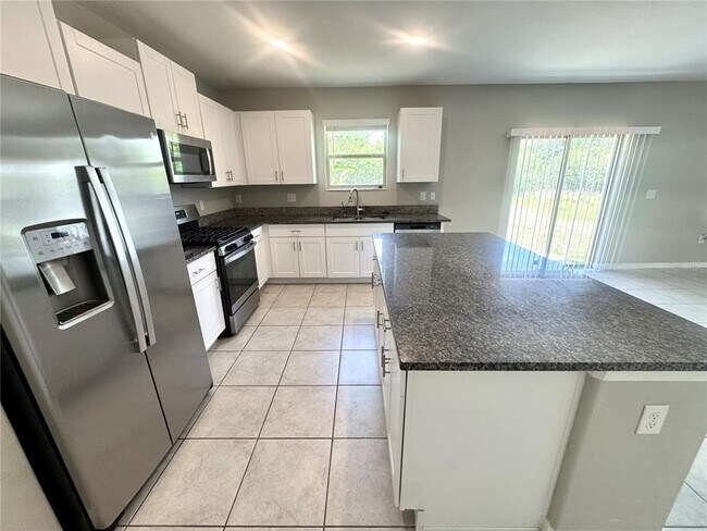 Building Photo - 5415 Amaryllis Garden St