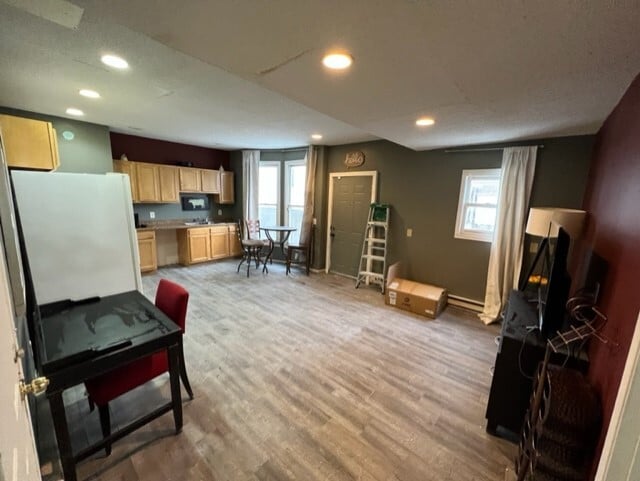 facing side door and kitchen from living area - 3040 Park Ave