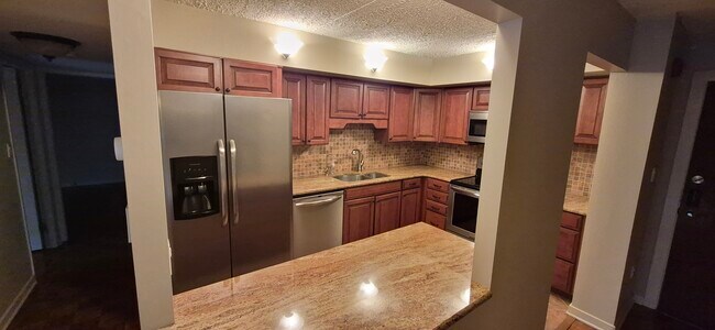 Cocina abierta al salón - 19 Rock Hill Rd