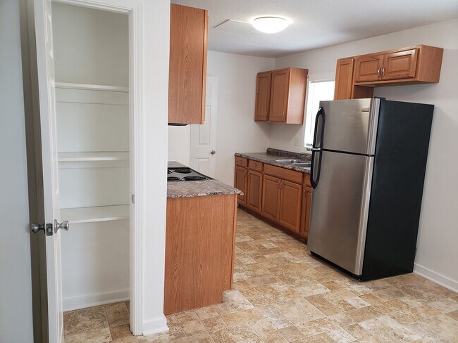 Kitchen and pantry that is accessed from the dining room - 6621 Walrond Ave