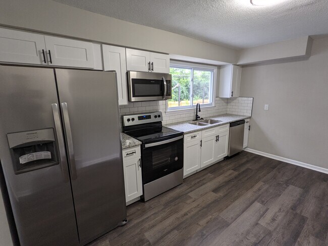 Building Photo - 4845 Downing Dr