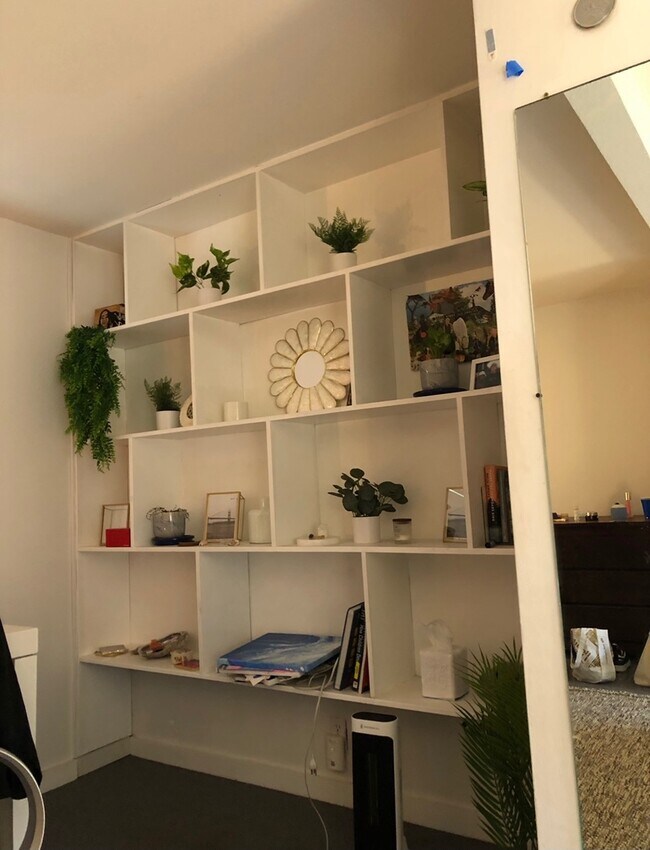 built in shelves in the room - 2521 College Ave