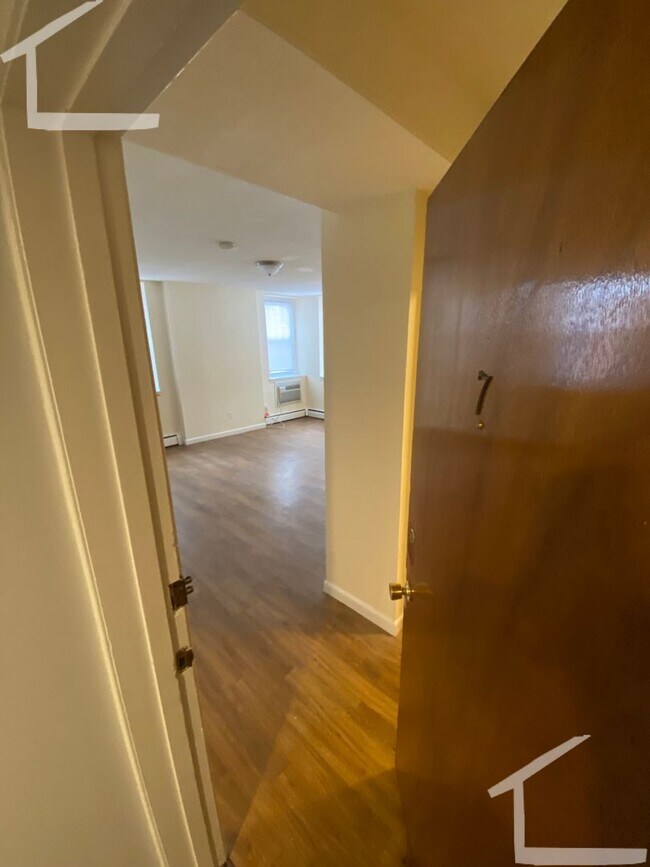 Building Photo - Huge studio with heat included.
