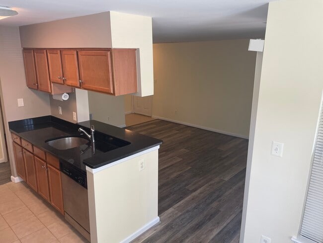 Living area from dining - 11710 Olde English Dr
