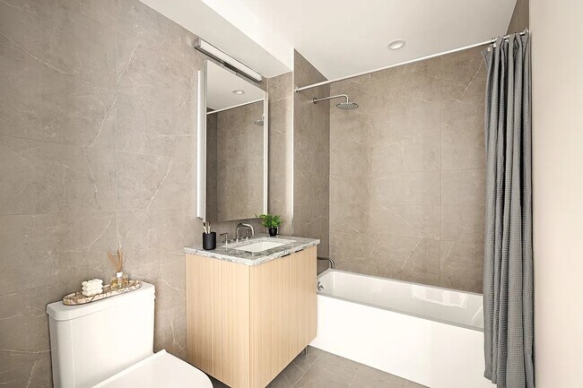 Foto del edificio - 100 Sullivan Pl