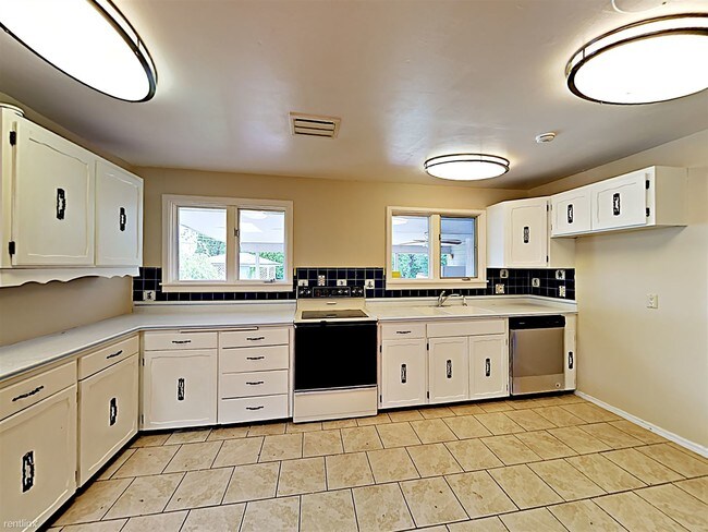 Building Photo - 4 br, 2 bath House - 1305 S 22nd Ave