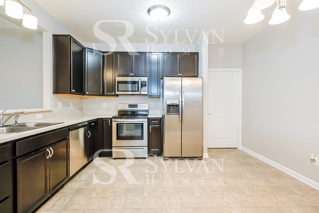 Building Photo - Turn the key. Enter. Smile. Repeat every day!