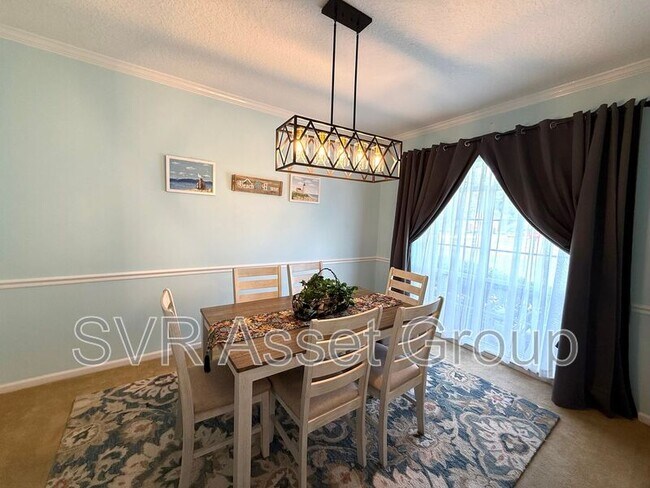 Building Photo - 8997 Adams Walk Dr
