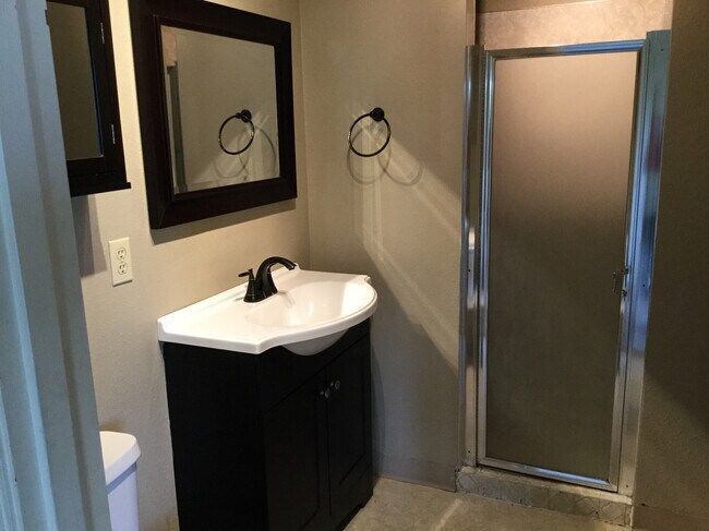 Master bathroom with walk in shower - 105 NE Ellis Ave