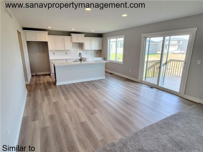 Building Photo - Spacious 4-Bedroom Home in Bondurant for Rent – $2,195/month