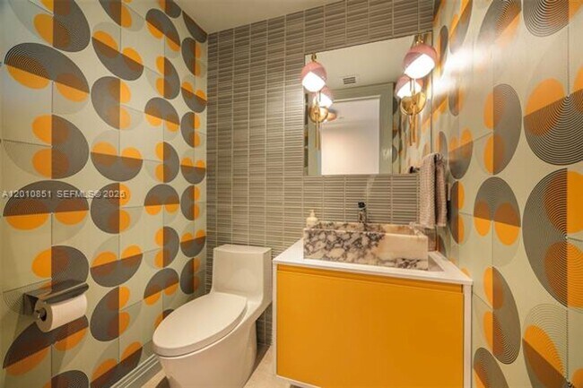 Building Photo - 5875 Collins Ave