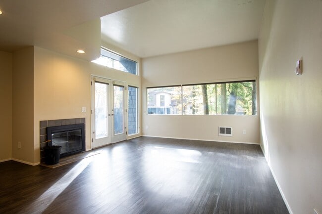 Building Photo - INCREDIBLE SPECIAL! Gorgeous & Bright 1-Bed w/ Wood-Burning Fireplace, W/D, & Private Patio!