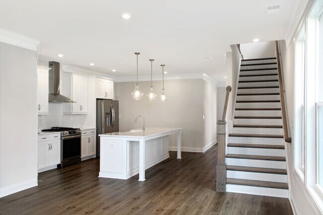 Building Photo - First-floor Primary with 2-car garage