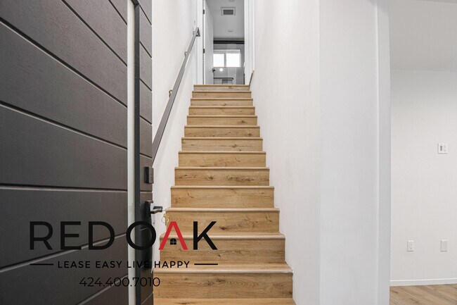 Building Photo - Luxurious and Spacious Three Story, Three ...