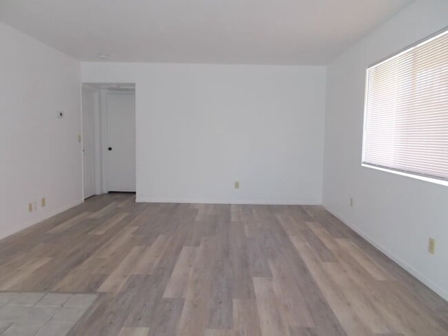 Building Photo - Charming Upstairs Condo with Private Balcony