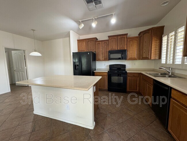 Building Photo - 17728 W Acapulco Ln