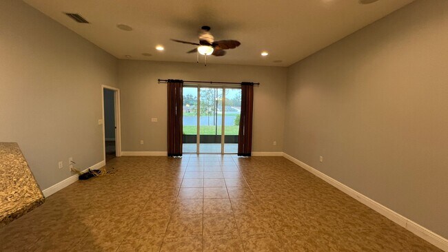 Building Photo - Serene Lakefront Living at Its Best! 4BD/3...