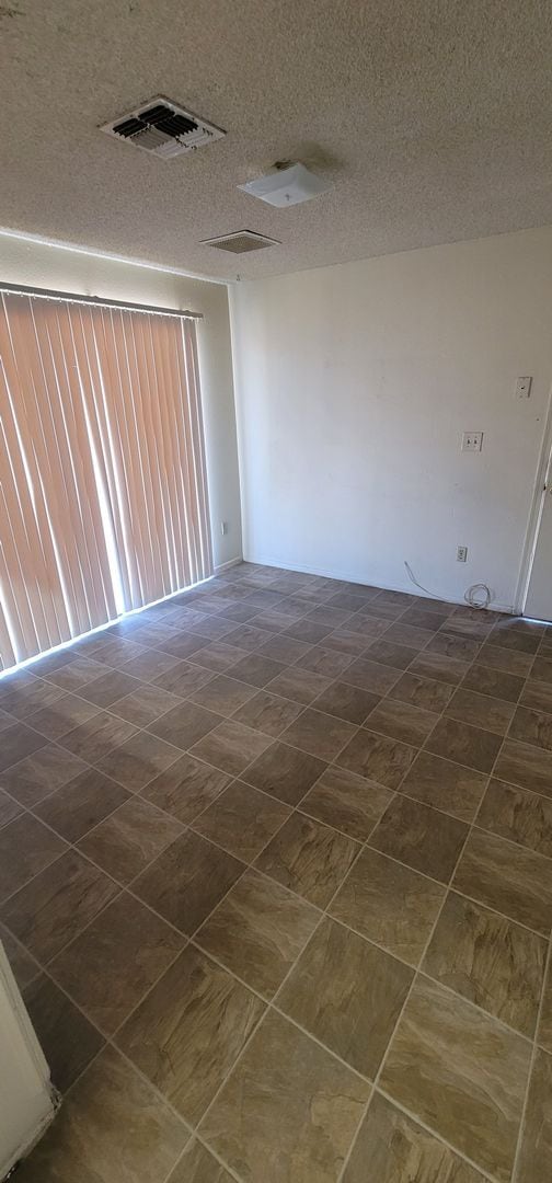 Building Photo - 3-Bedroom Home with Spacious Backyard & Ca...