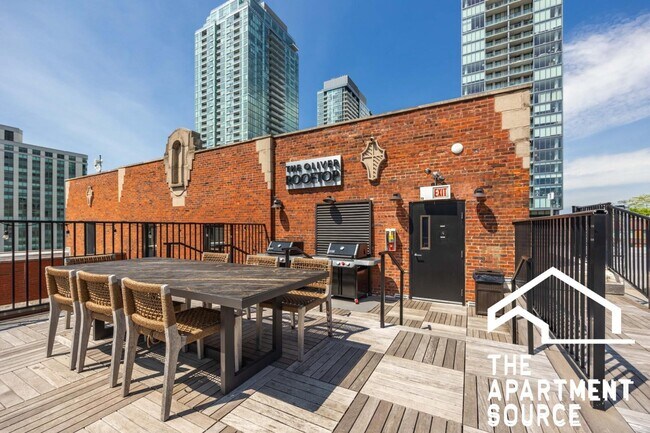 Building Photo - 1140 North Lasalle Drive #823 (Plus Den)