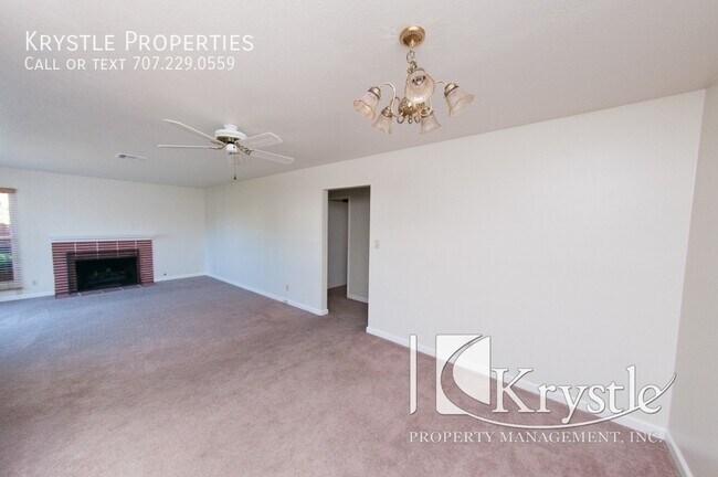 Building Photo - Charming Home with Fireplace, Sunroom, and...