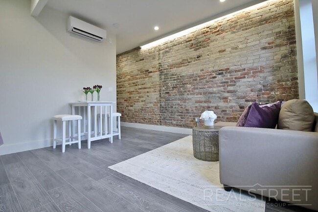 Building Photo - Spacious 2BR w/ Laundry, Pets OK, Backyard & Lounge | Steps to Brower Park & 3/4/C Trains