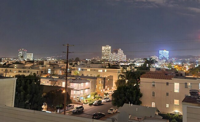 Rooftop deck view at night - 1800 Butler Ave