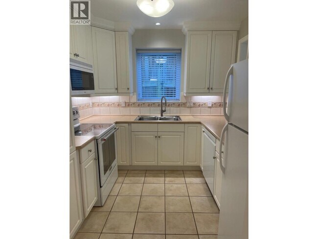 Photo du bâtiment - 32X W 14TH AVENUE