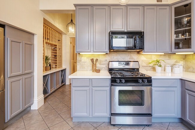 Spacious Updated Kitchen with dedicated wine storage, Bosch dishwasher, and Quartz countertops - 2188 Sutter St
